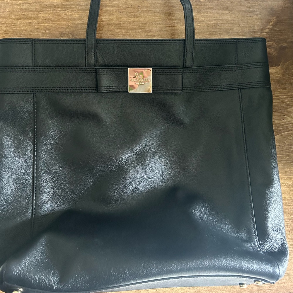 Kate Spade black leather tote. With Kate spade card. Like new.